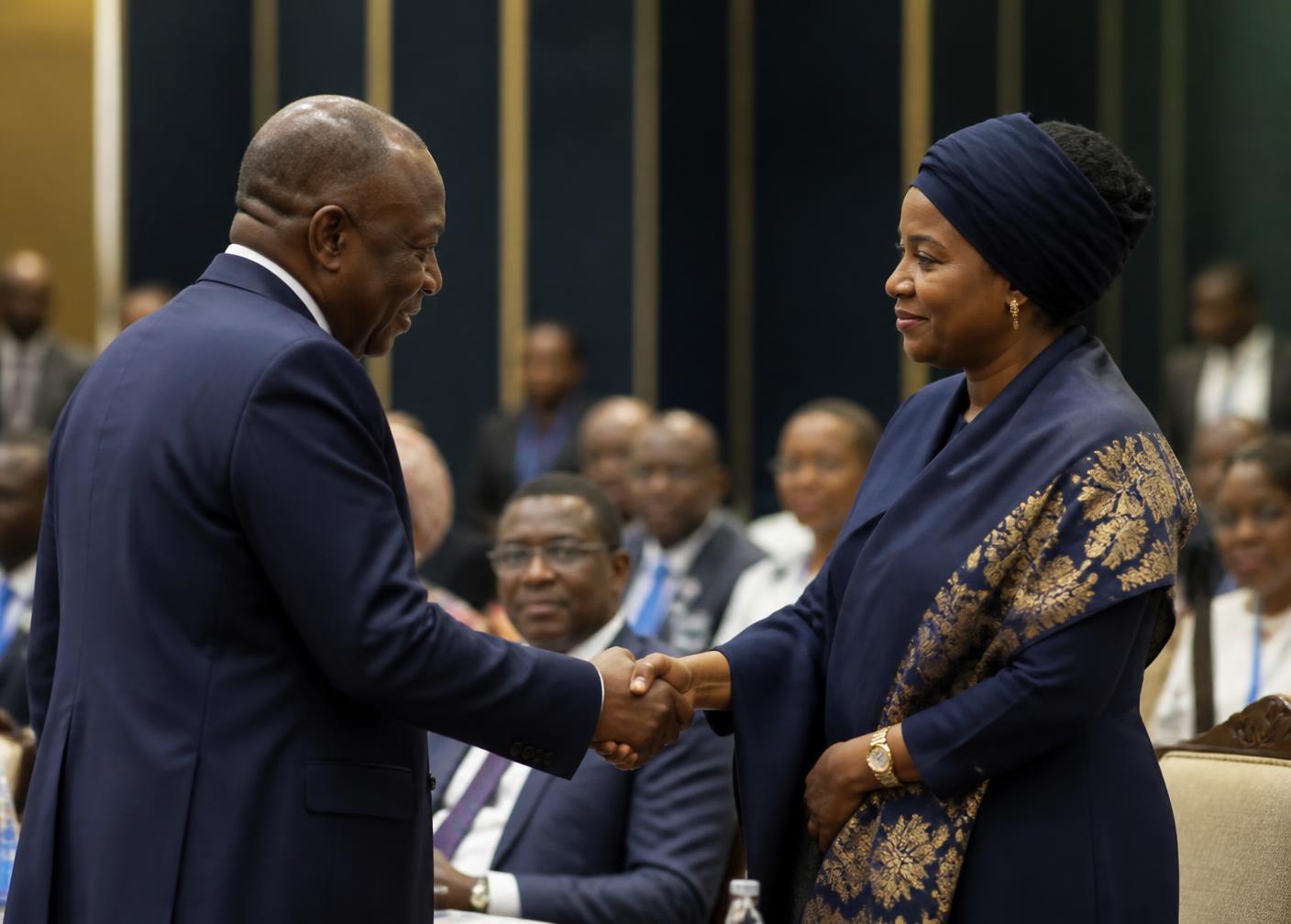 Two professionals shaking hands after a partnership meeting.